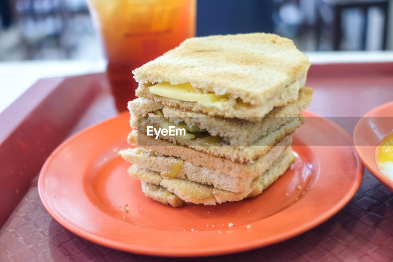 food and drink, food, meal, dish, plate, breakfast, healthy eating, fast food, bread, freshness, table, fruit, produce, sandwich, drink, lunch, baked, juice, refreshment, cafe, wellbeing, no people, restaurant, sweet food, close-up, toasted bread, dessert, dairy, indoors