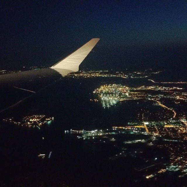 ILLUMINATED CITYSCAPE AT NIGHT