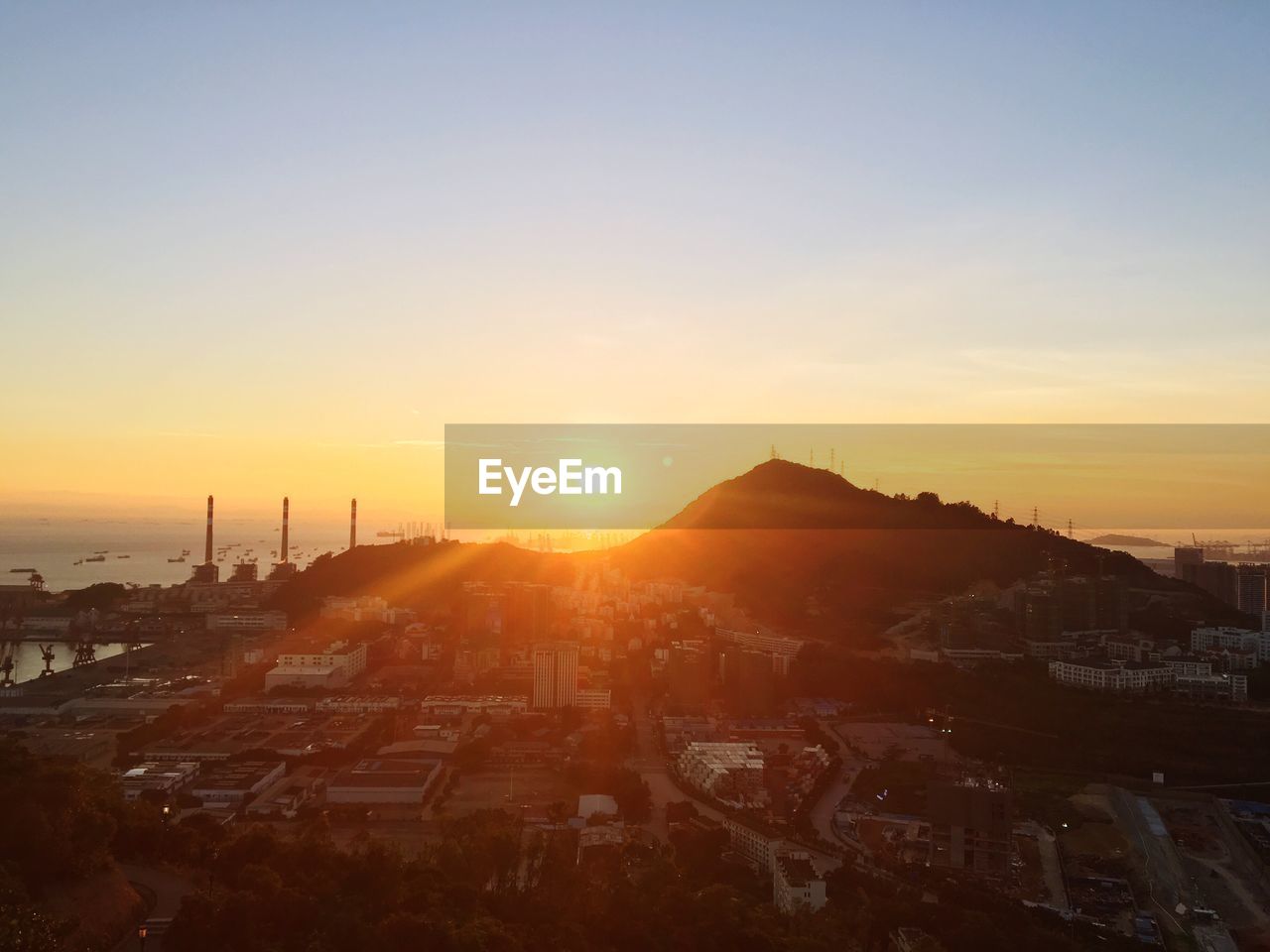 View of cityscape at sunset