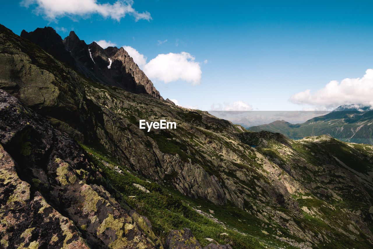 Scenic view of rocky mountains against sky