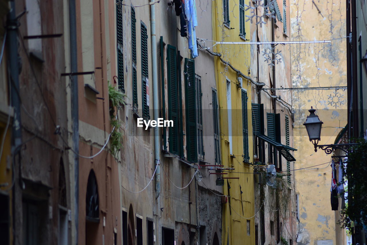 Low angle view of old residential buildings in town