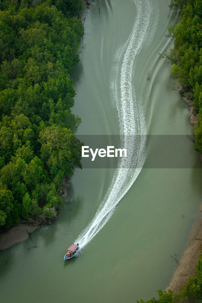 SCENIC VIEW OF BOAT ON RIVER