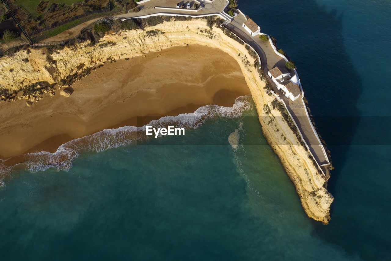 Portugal, faro district, drone view of fort of nossa senhora da rocha and praia nova beach