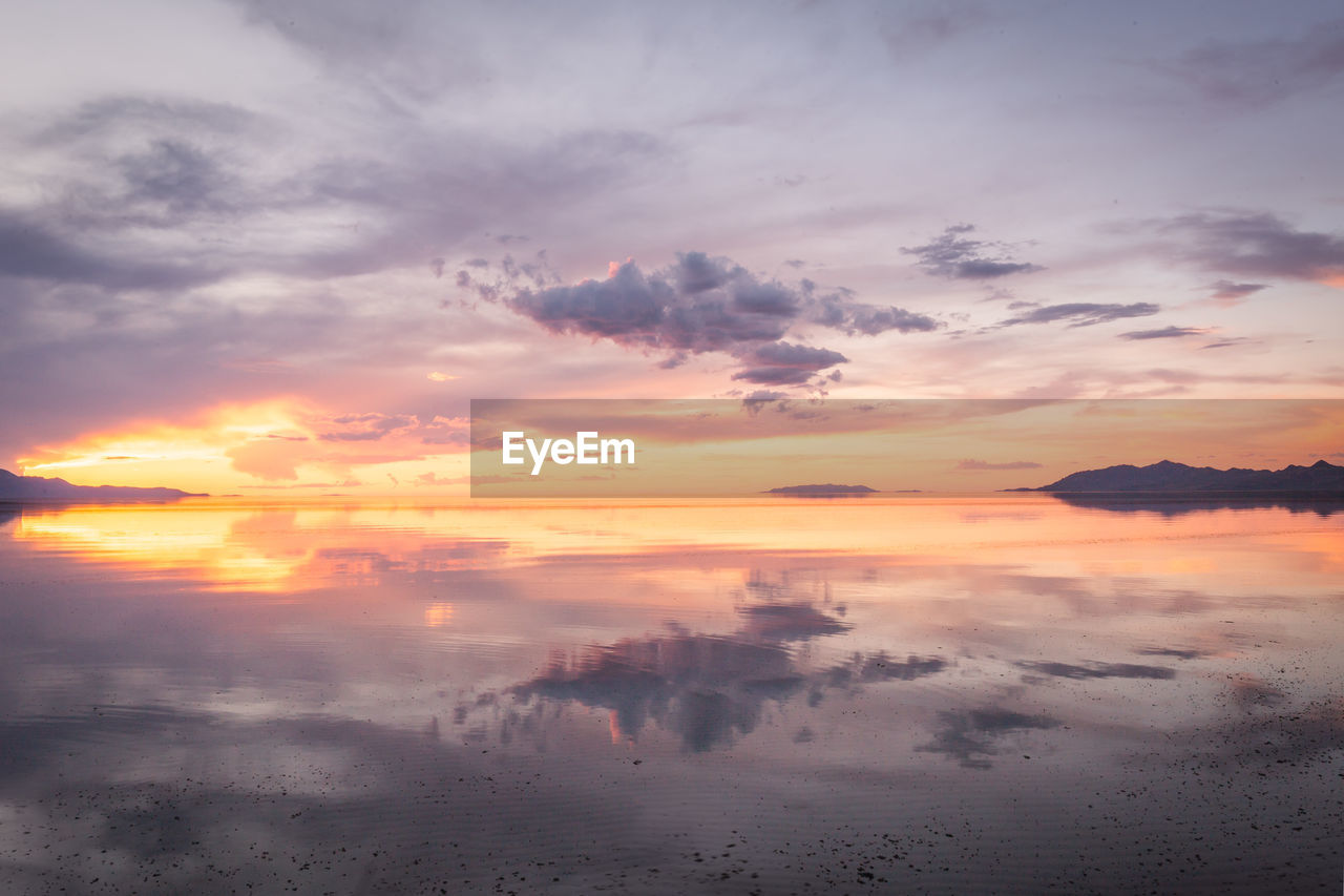 SCENIC VIEW OF SEA DURING SUNSET