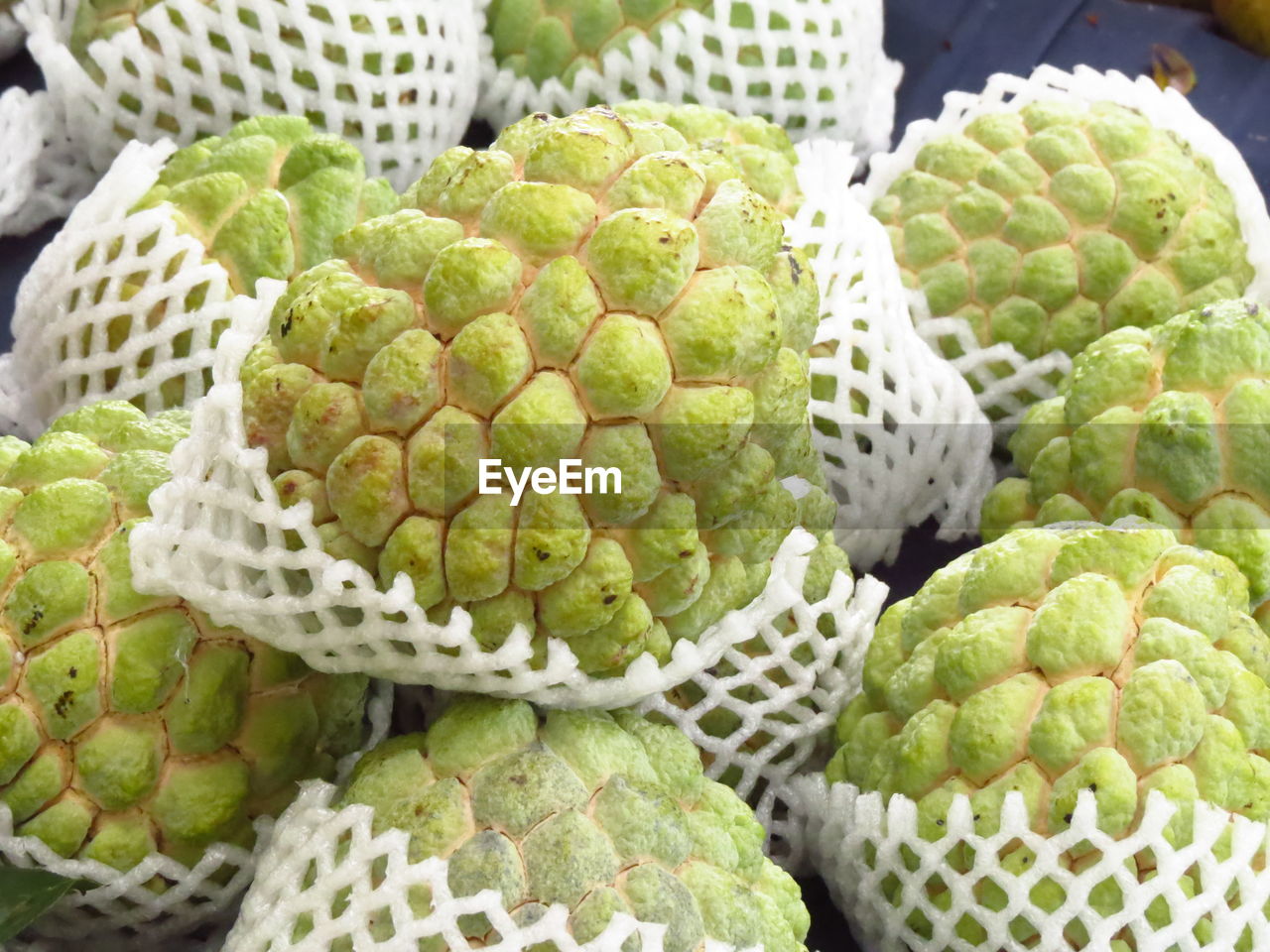 Close-up of custard apple fruits for sale in market