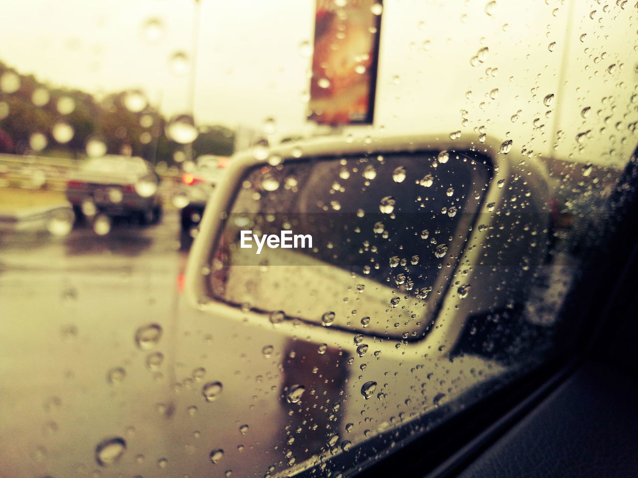 Close-up of raindrops on car window