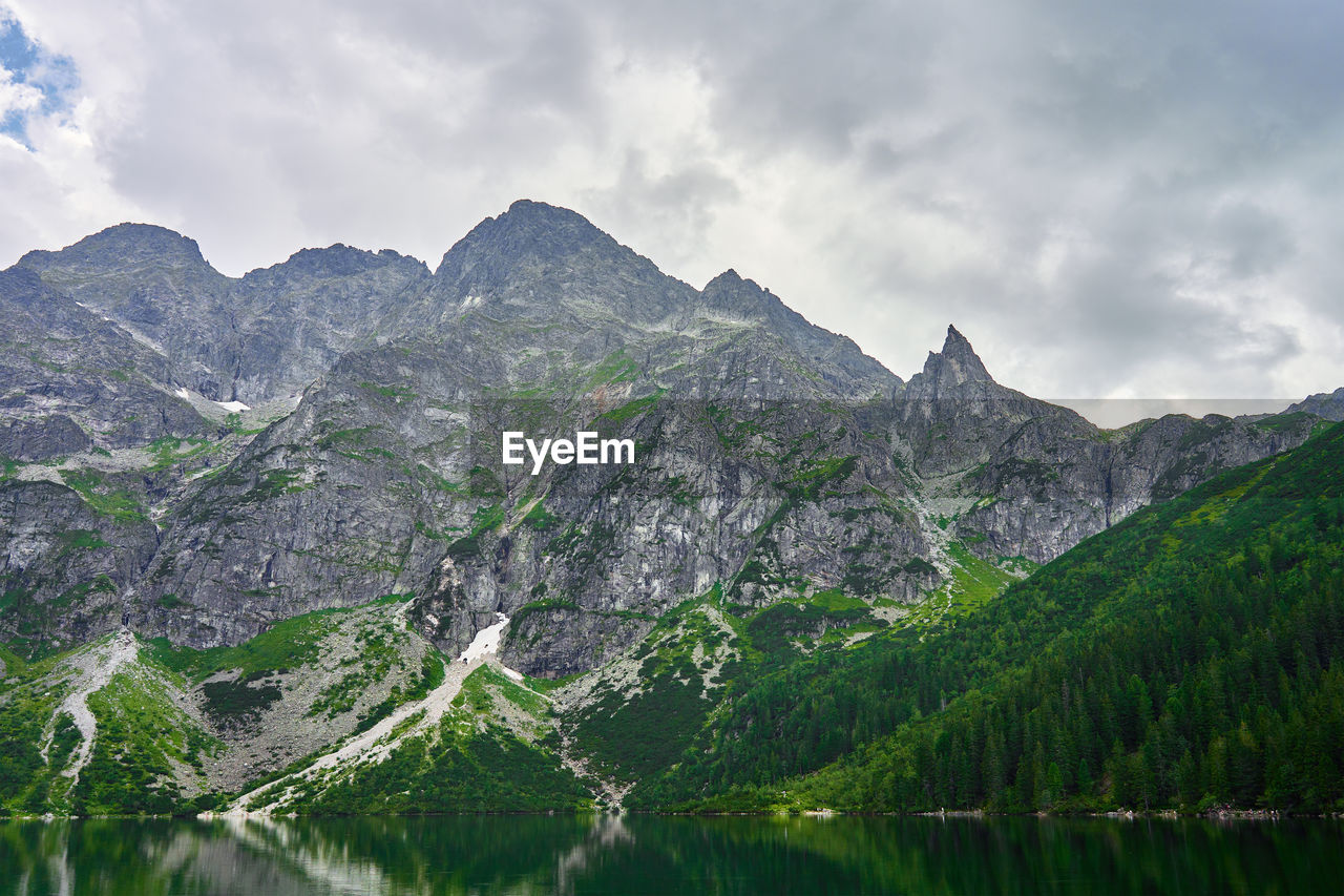 Mountains range near beautiful lake. tatra national park in poland. morskie oko or sea eye lake