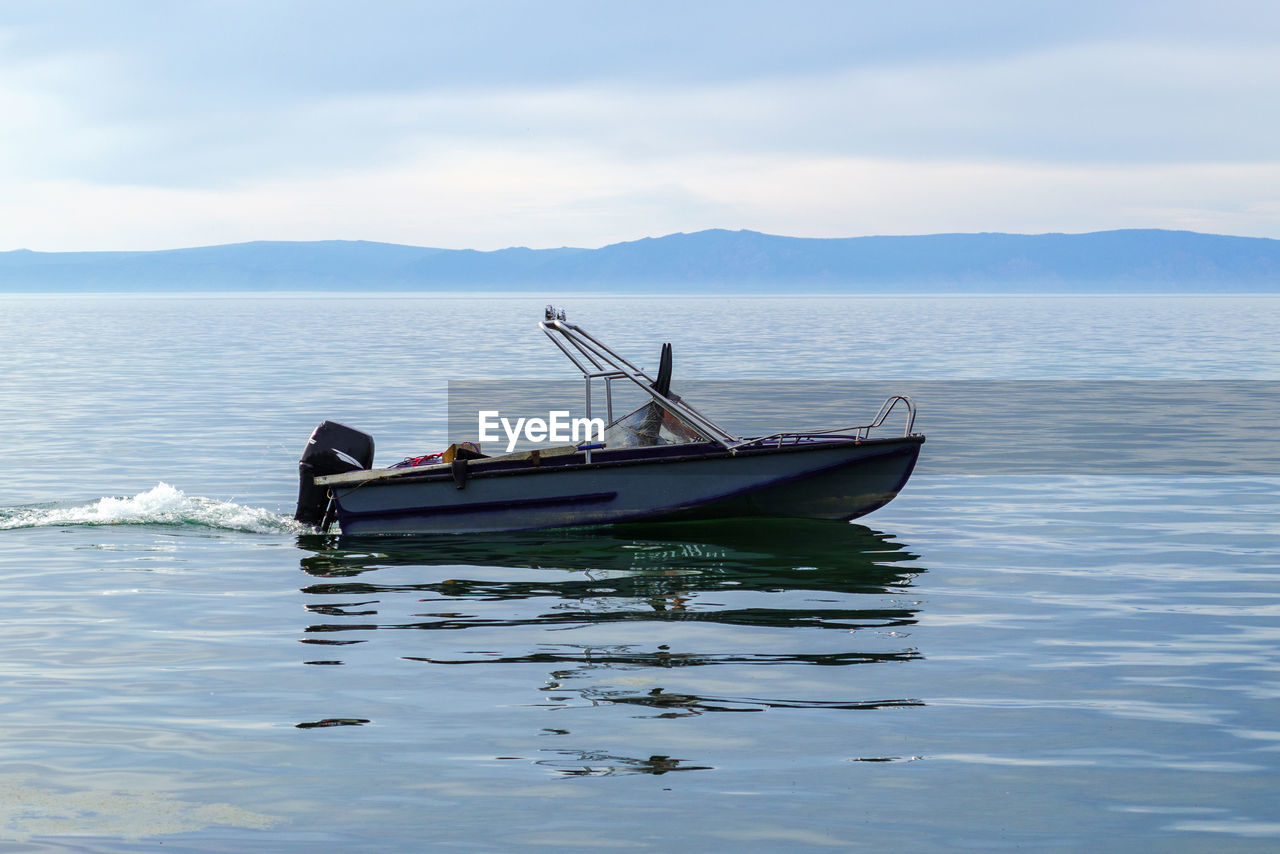 Motor boat on a lake without people