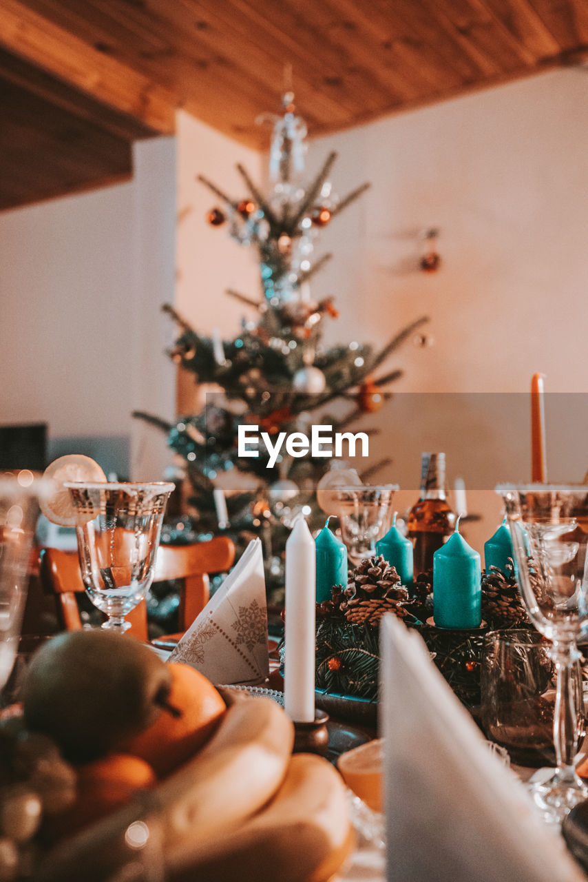 Close-up of christmas decorations and food on table