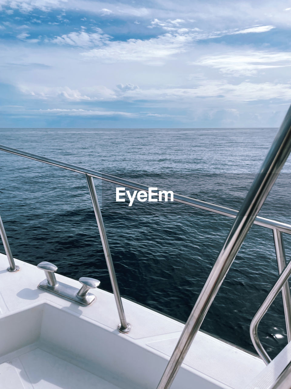 close-up of boat in sea against sky