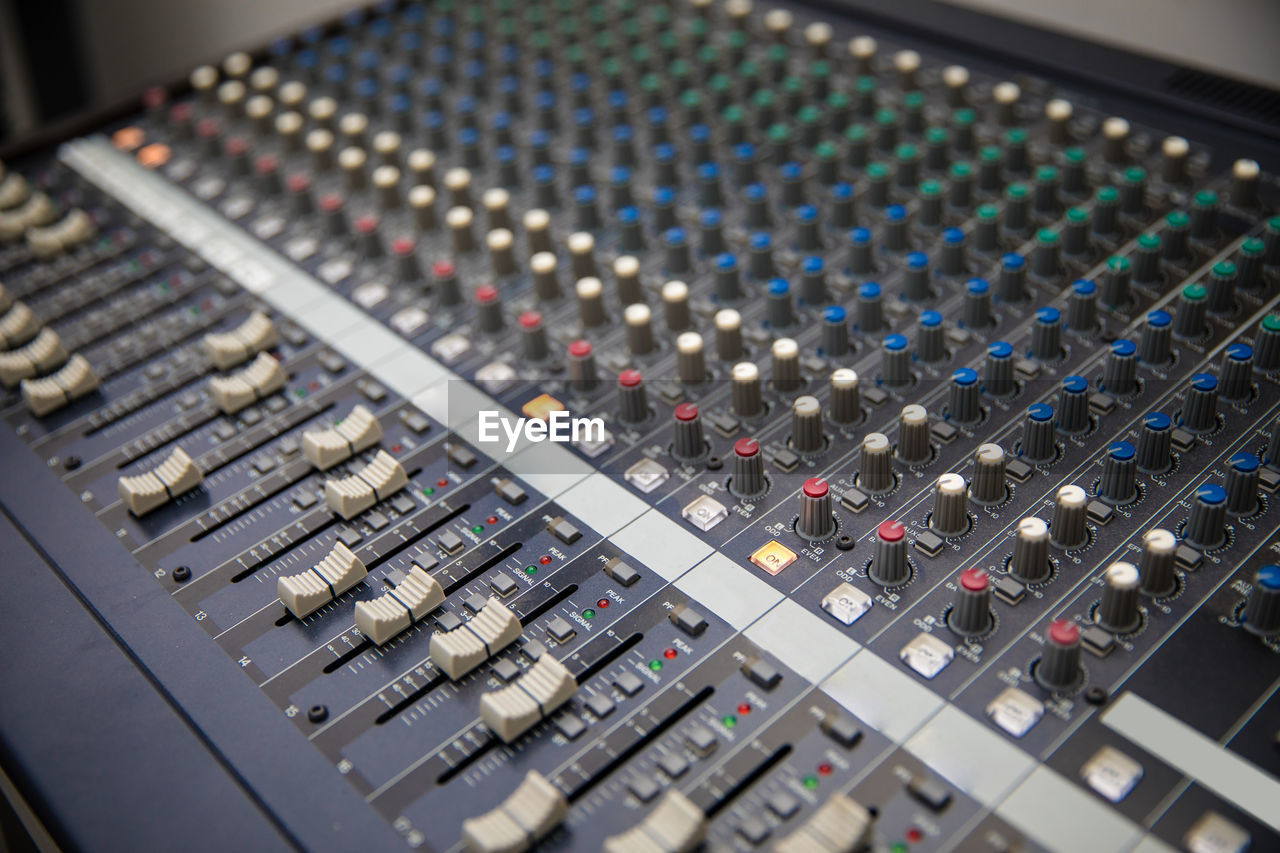 Closeup of professional audio digital mixing sound console