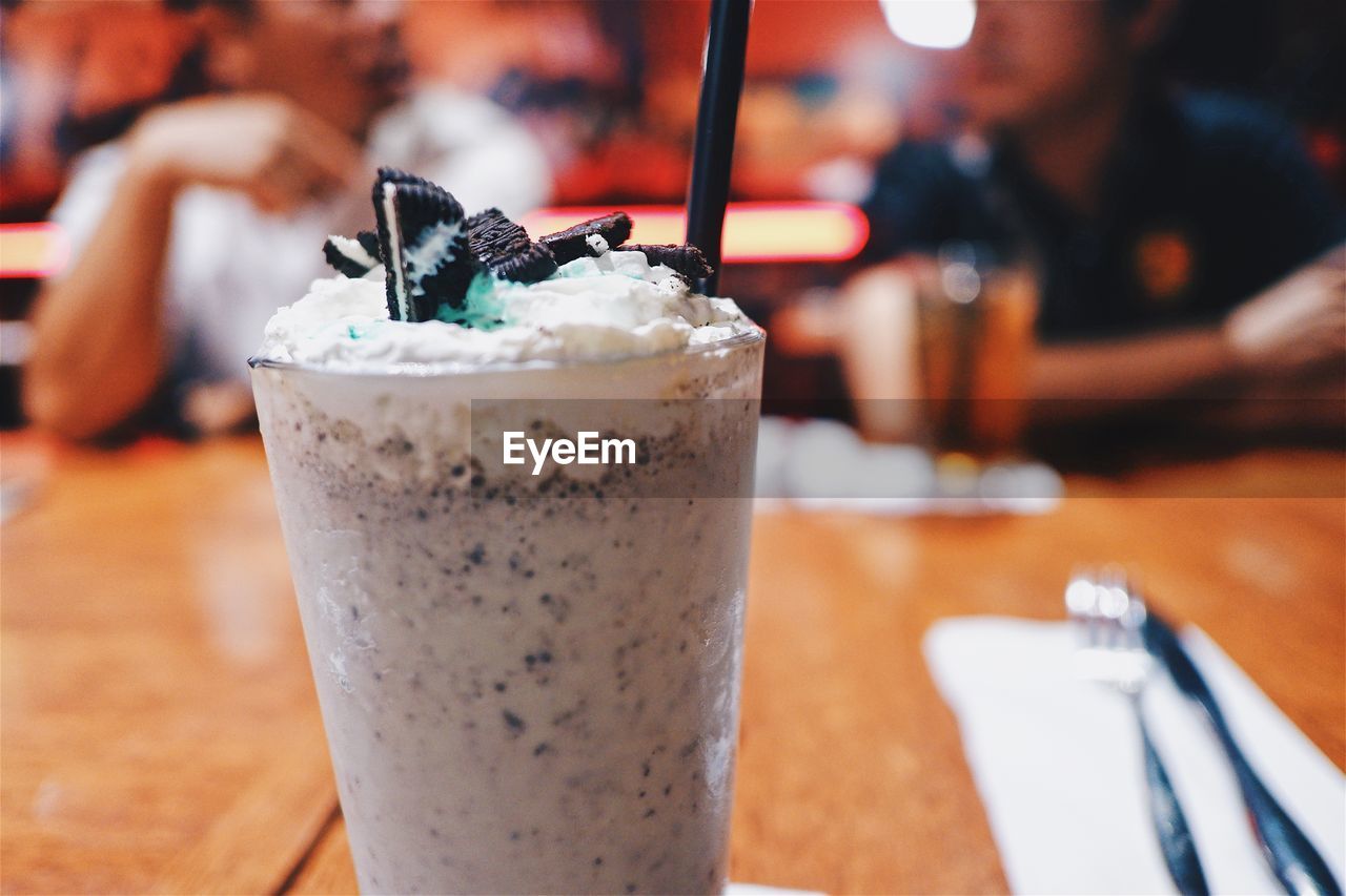 Close-up of drink on table at cafe