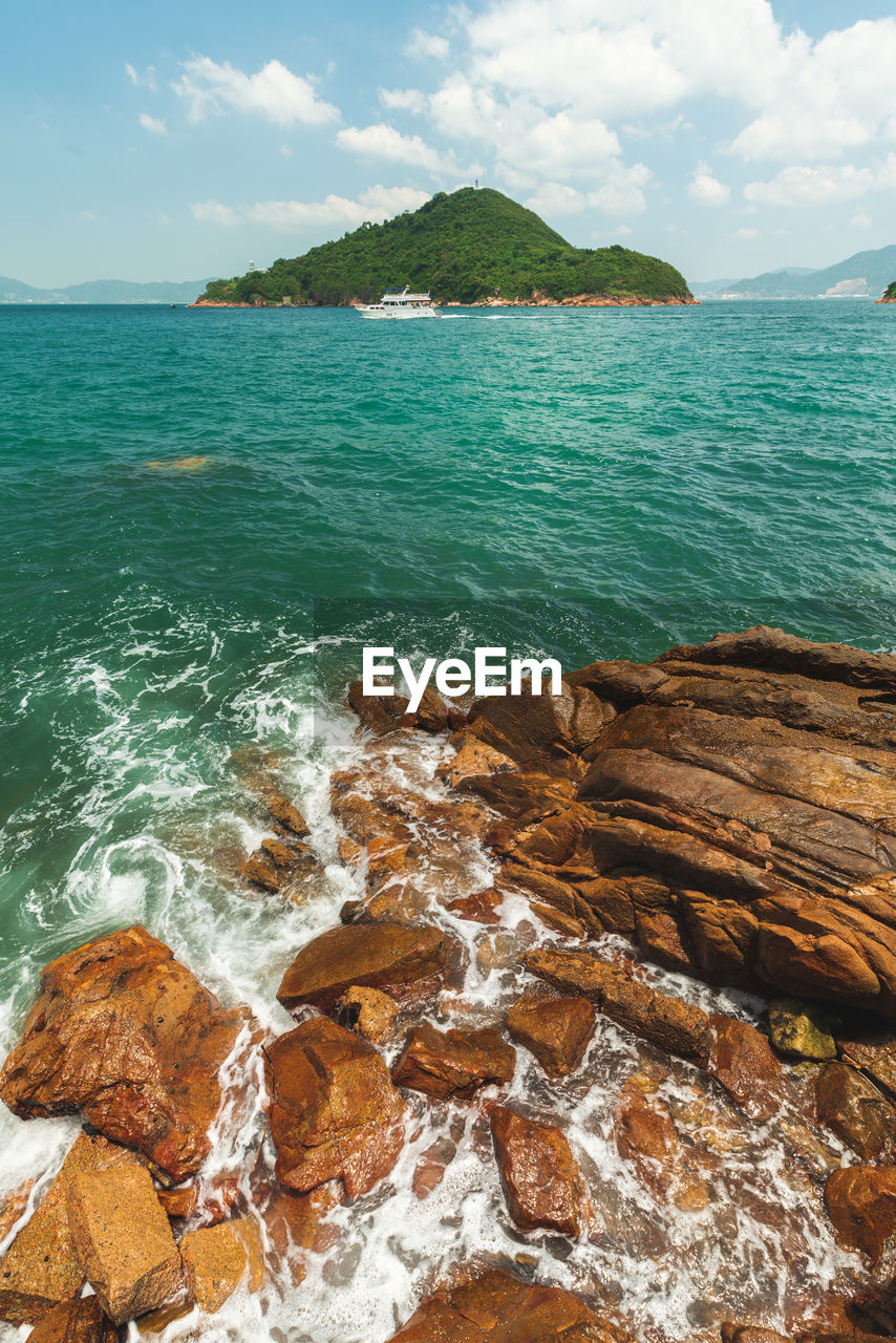 SCENIC VIEW OF SEA AND ROCKS