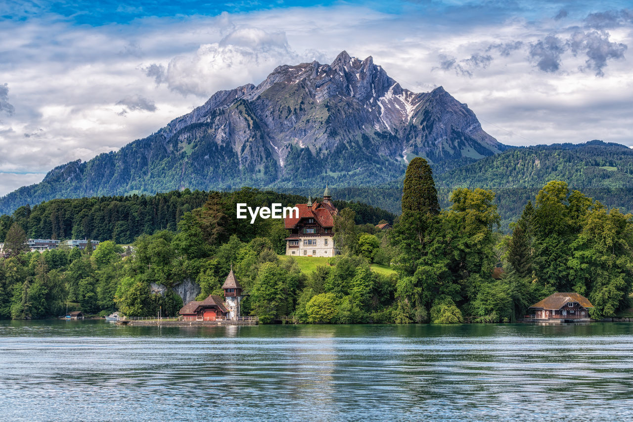 The view of mount pilatus mountain tops while on a boat cruise in lake lucerne. taken in luzern