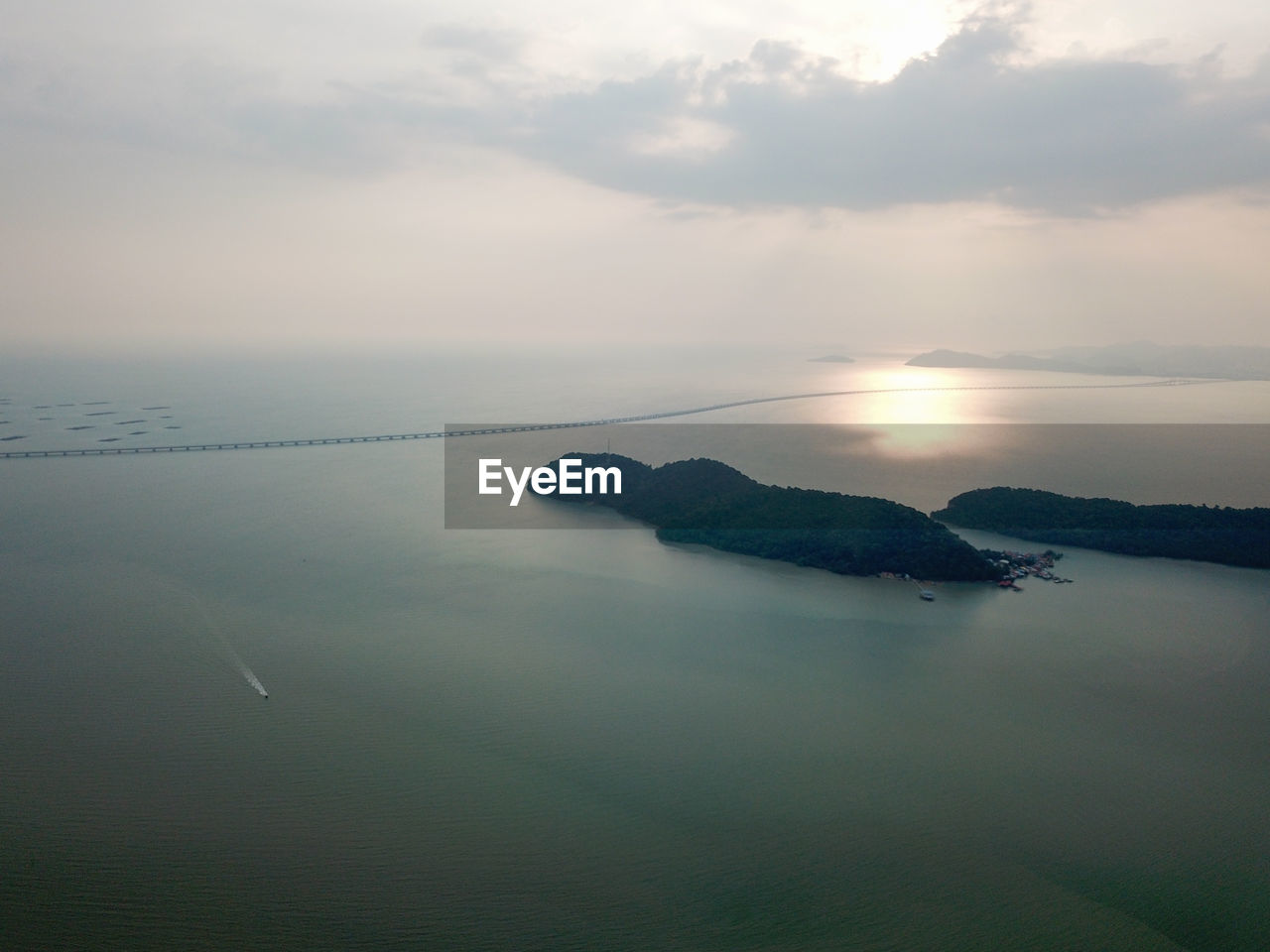 Scenic view of sea against sky at sunset