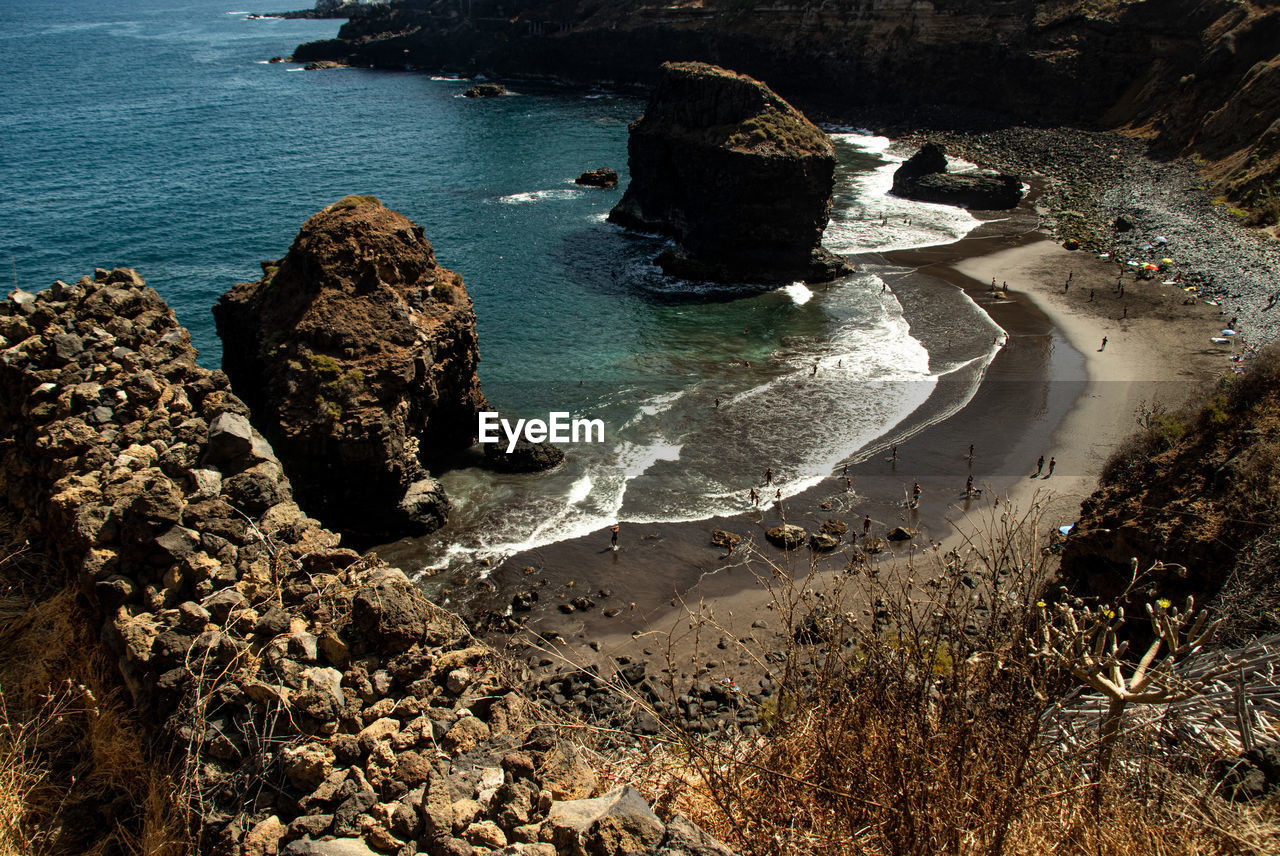 High angle view of rocks in sea