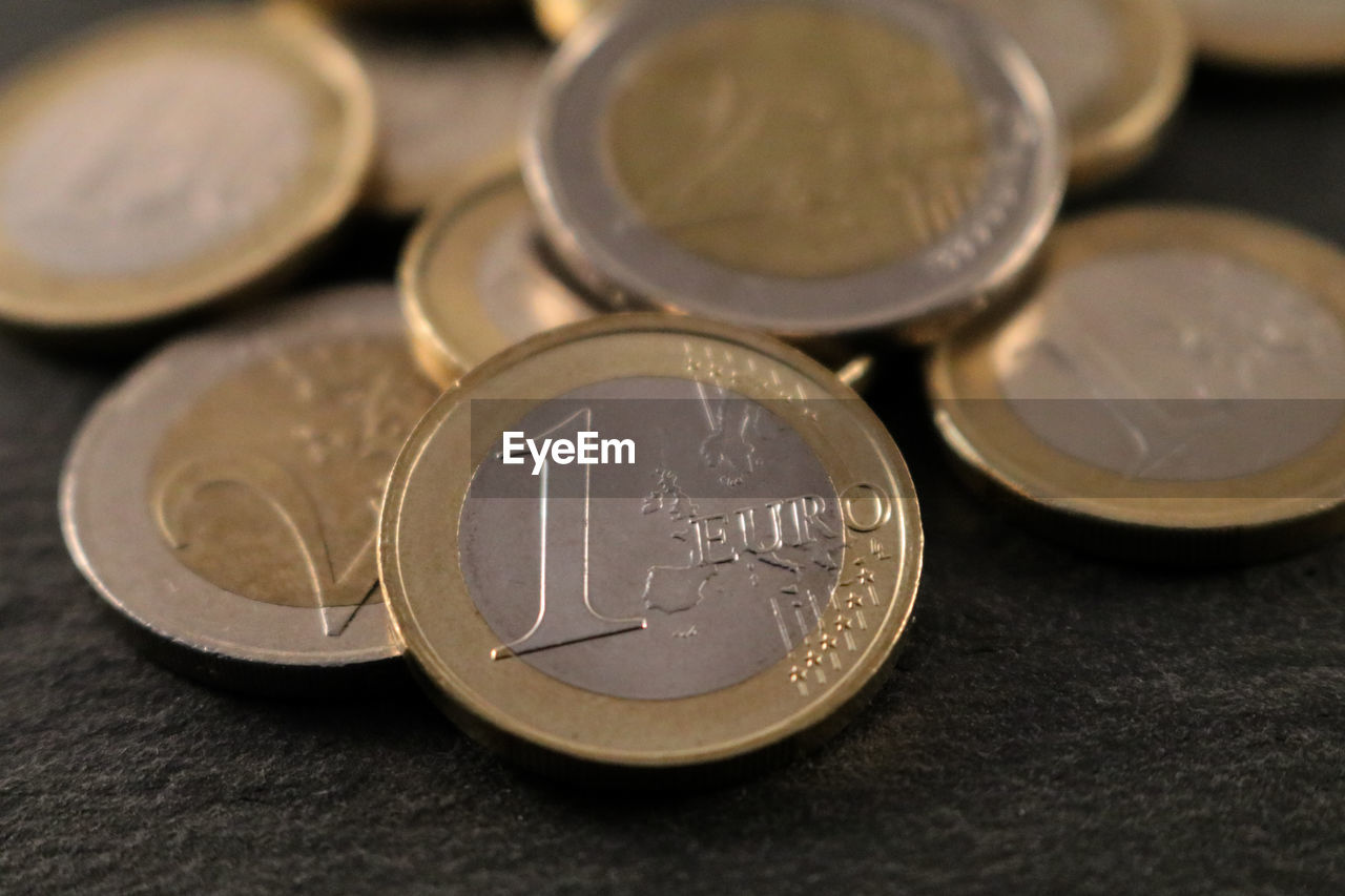 Close-up of coins on table