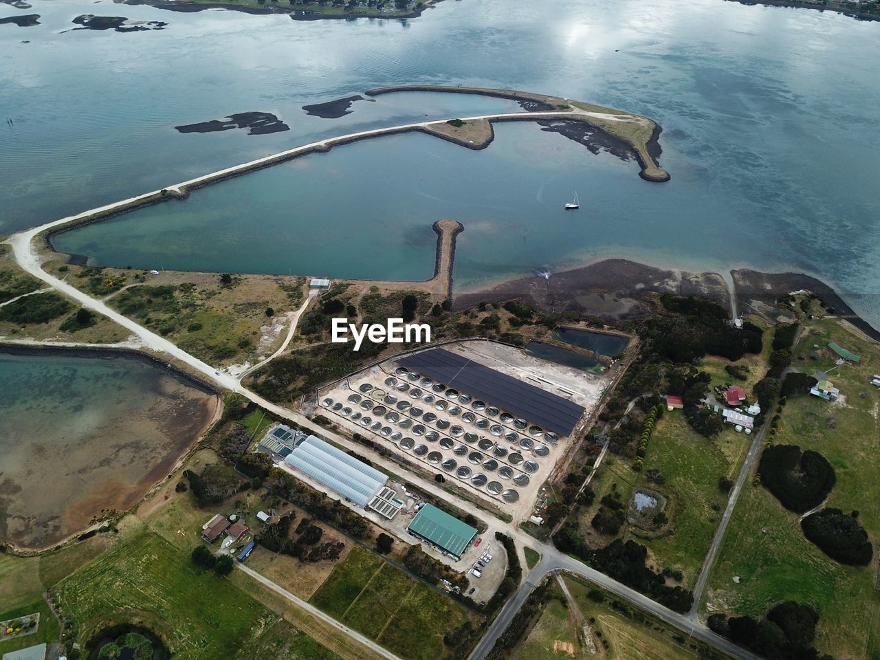 HIGH ANGLE VIEW OF SWIMMING POOL AT SEA