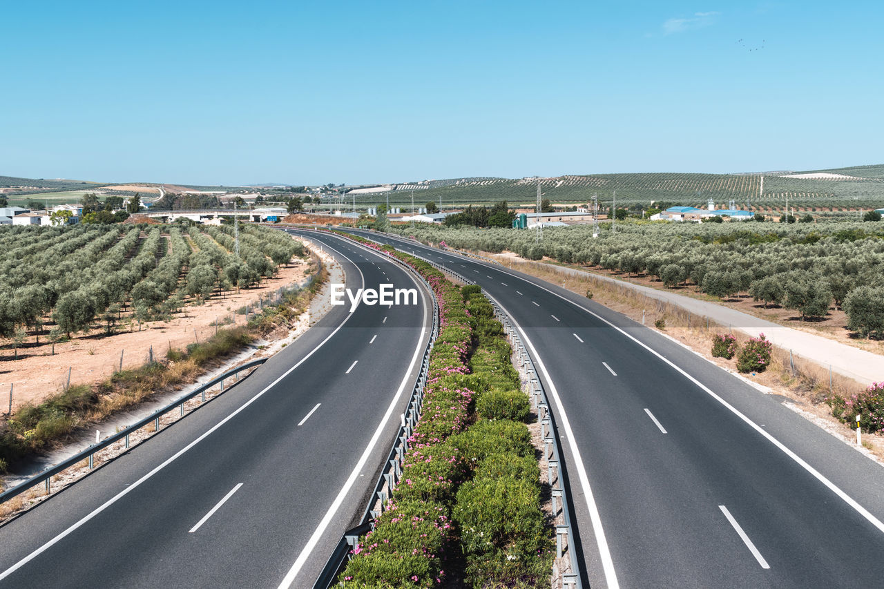 Driving on an empty asphalt road, lonely outback highway