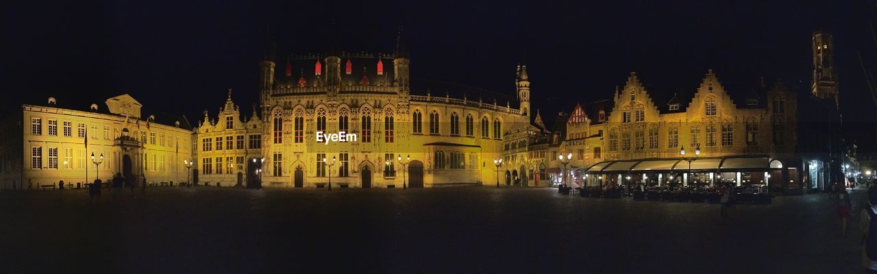 Panoramic view of illuminated buildings at night