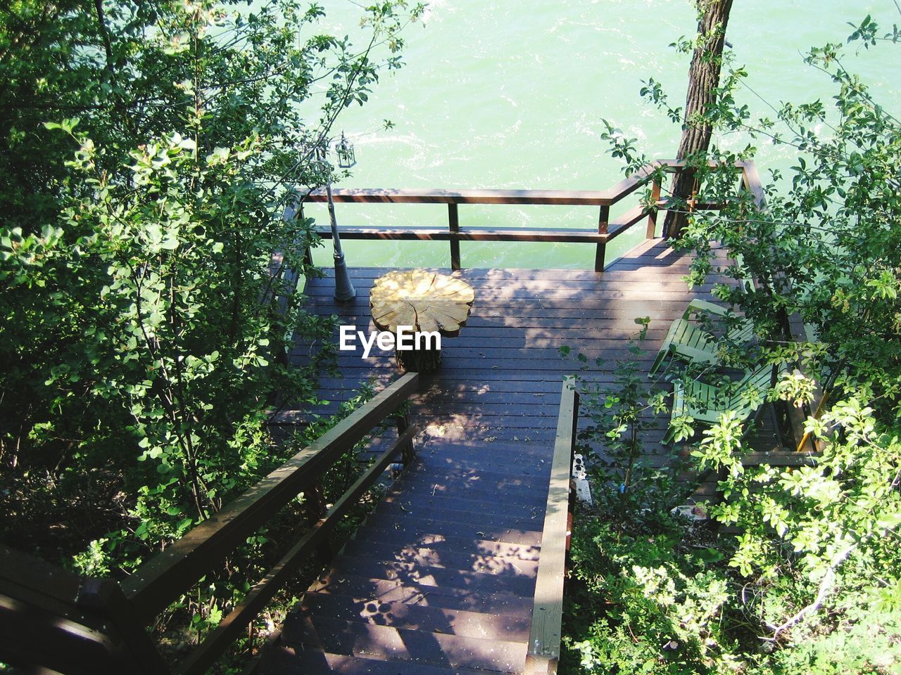 High angle view of staircase at riverbank