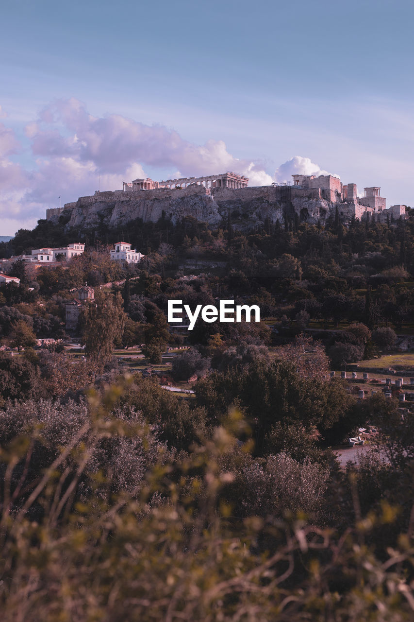 View of buildings in city against sky