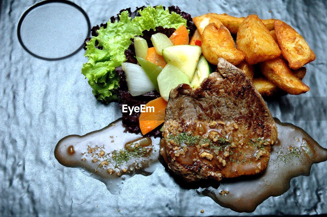 High angle view of steak served in plate