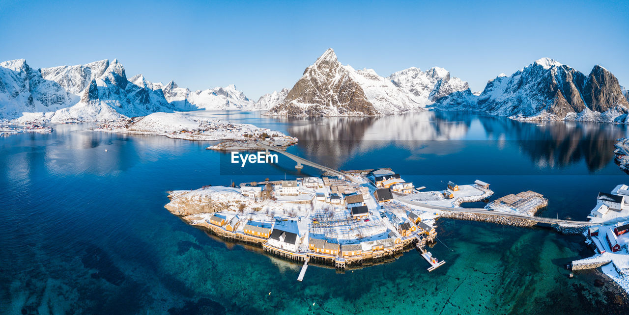 PANORAMIC VIEW OF LAKE AGAINST SKY DURING WINTER