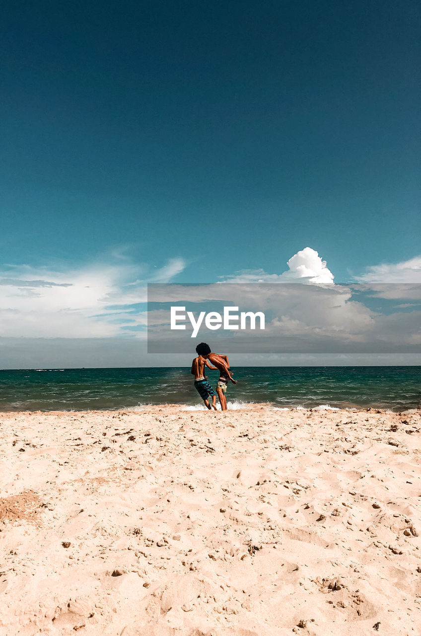 MAN ON BEACH