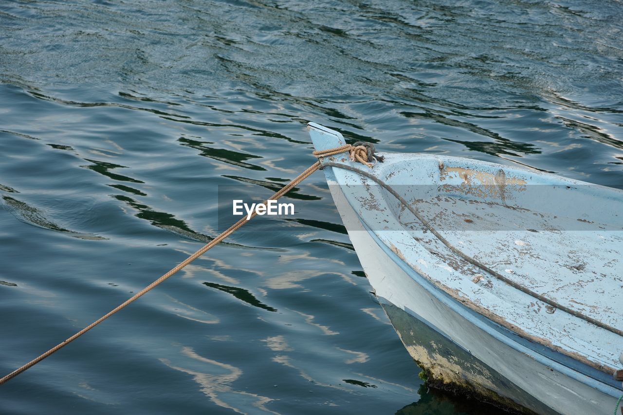 water, reflection, nautical vessel, sea, boat, nature, day, high angle view, no people, transportation, mode of transportation, vehicle, outdoors, rippled, wave, boating, beauty in nature, tranquility, animal, moored, animal themes