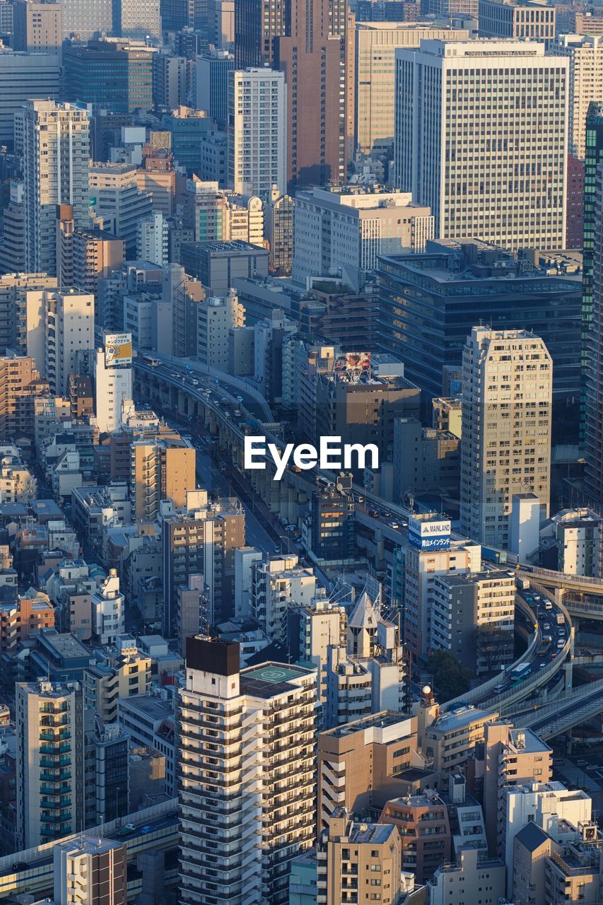 High angle view of modern buildings in city