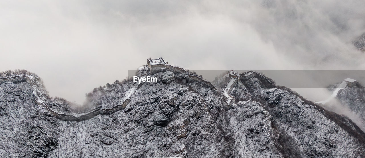 Low angle view of rocks against sky