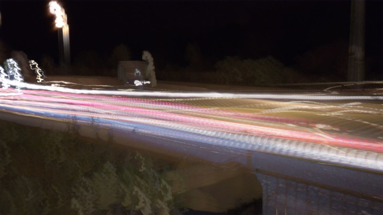 SURFACE LEVEL OF LIGHT TRAILS ON STREET