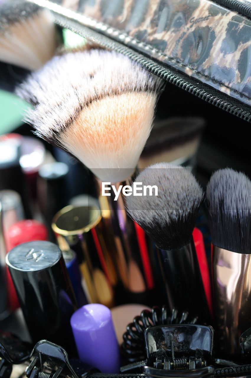 Close-up of make-up on table