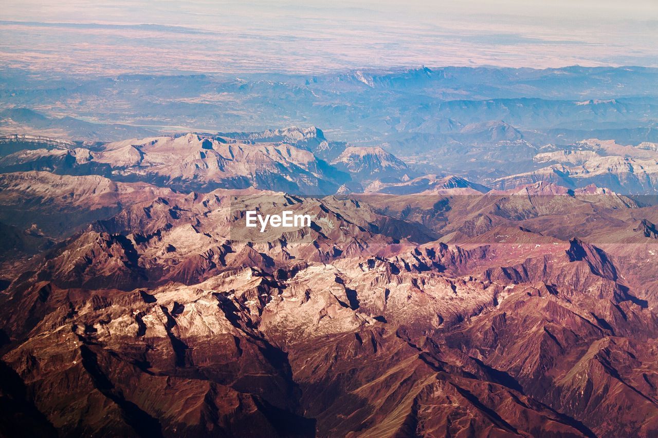 High angle shot of rocky landscape against sky