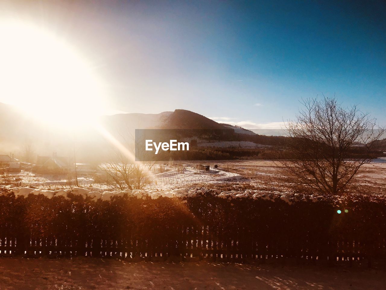 Scenic view of mountains against sky during winter