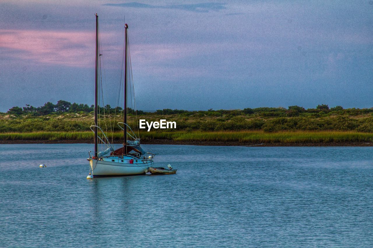 BOATS SAILING IN SEA