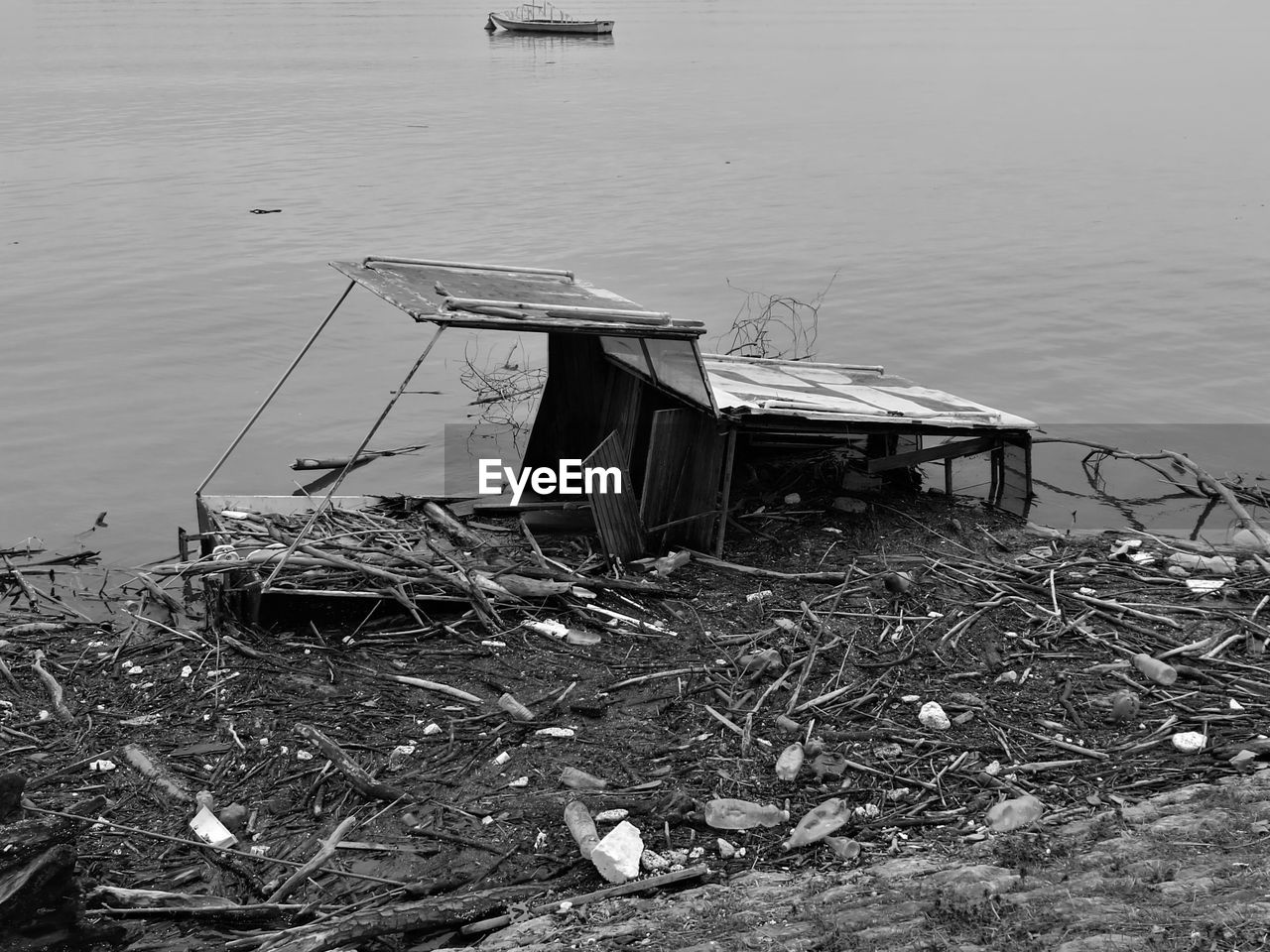 Abandoned boat in lake