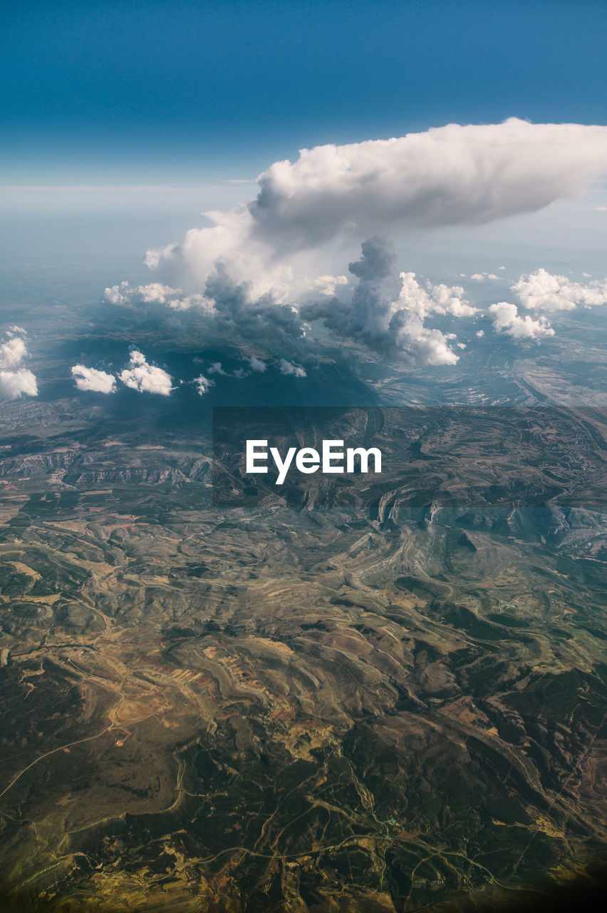 Aerial view of cityscape against sky