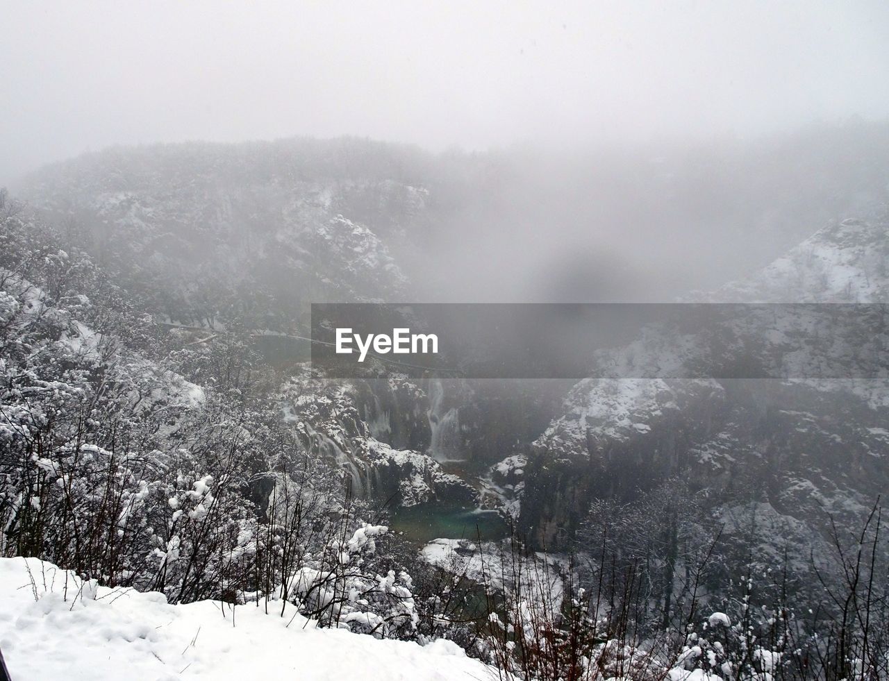 SCENIC VIEW OF SNOW COVERED LANDSCAPE