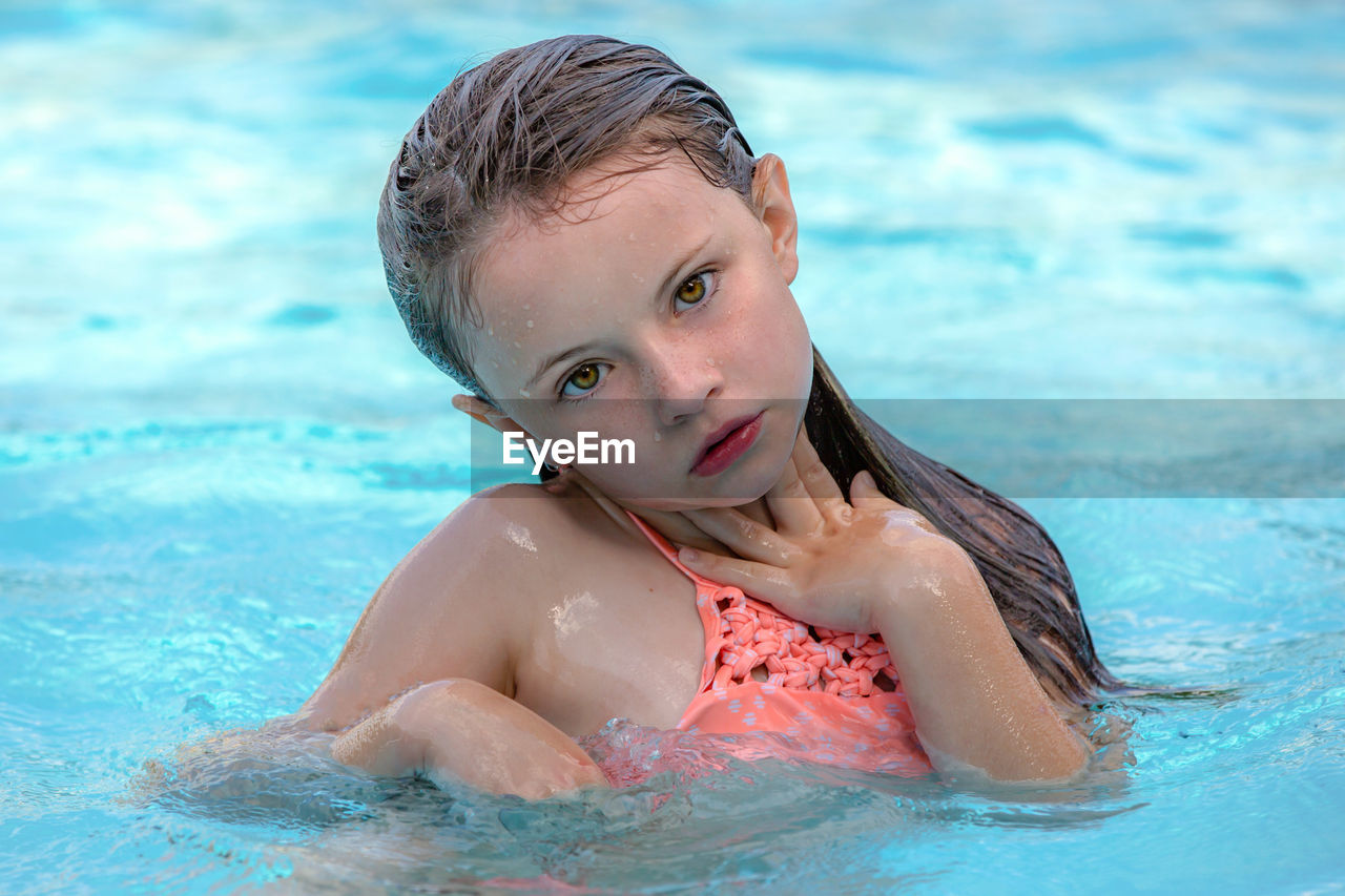 Portrait of girl in swimming pool