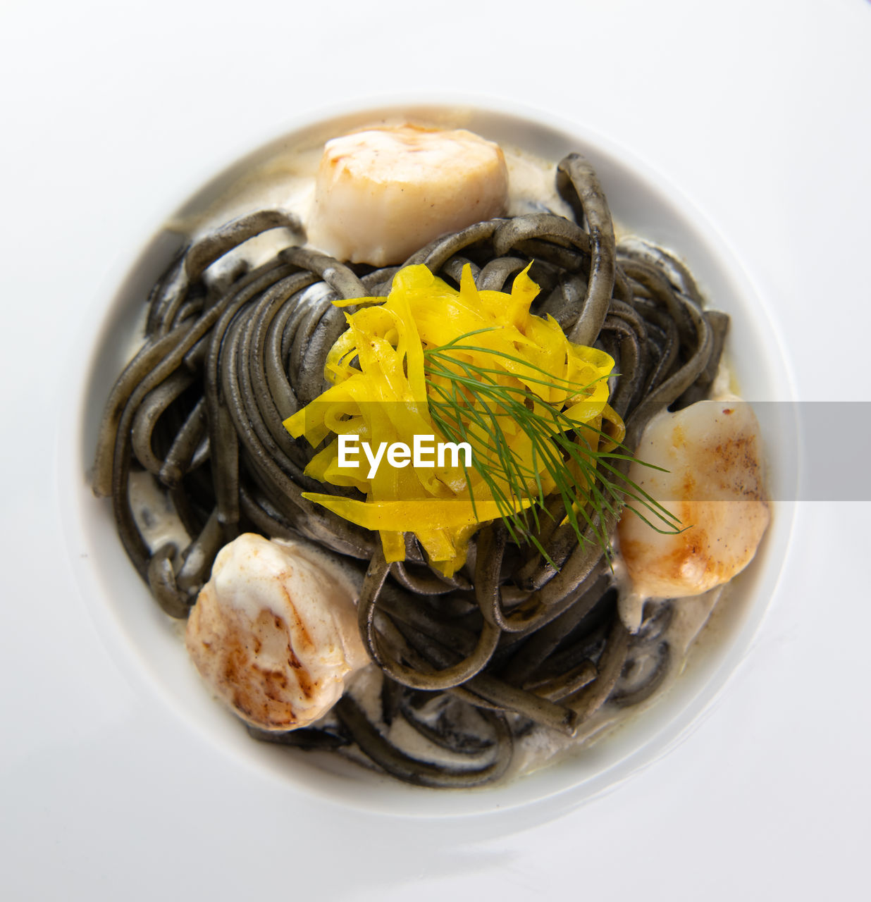 directly above shot of food in bowl on white background