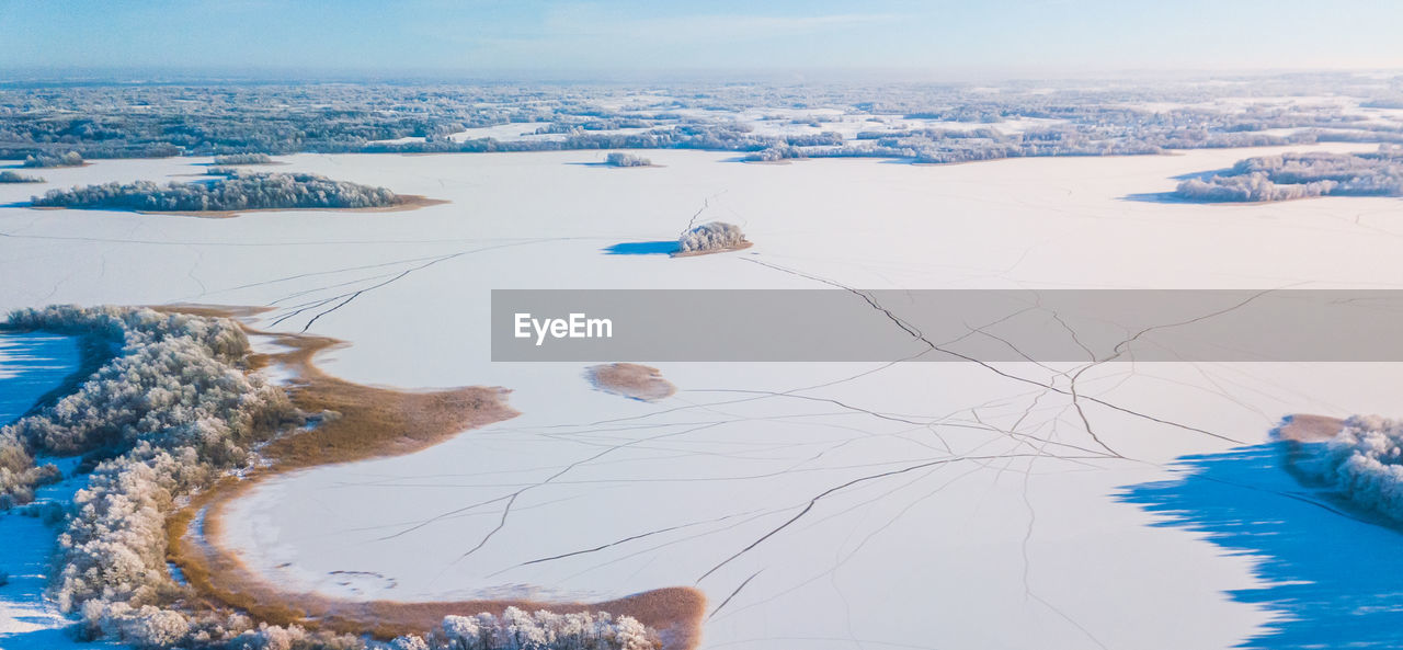 scenic view of snow covered field