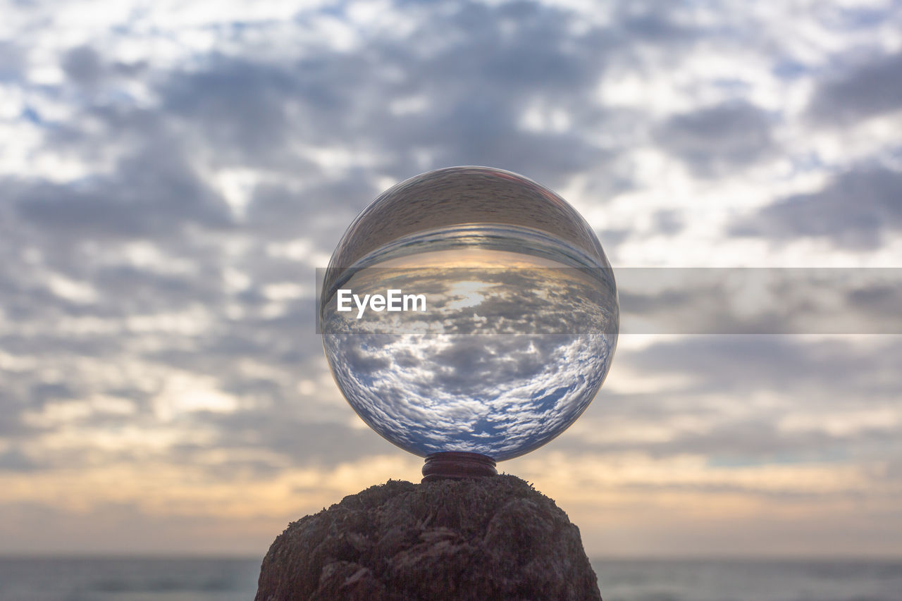 REAR VIEW OF A CRYSTAL BALL