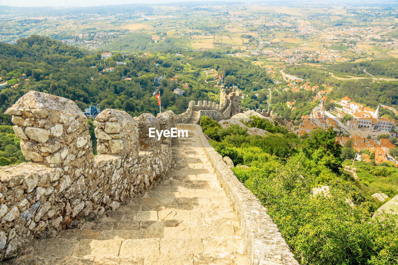 High angle view of steps on mountain during sunny day