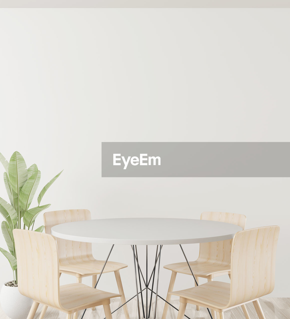 CHAIRS AND TABLE AGAINST WHITE BACKGROUND