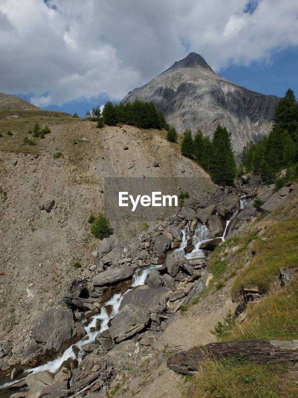 Scenic view of rocky mountains against sky