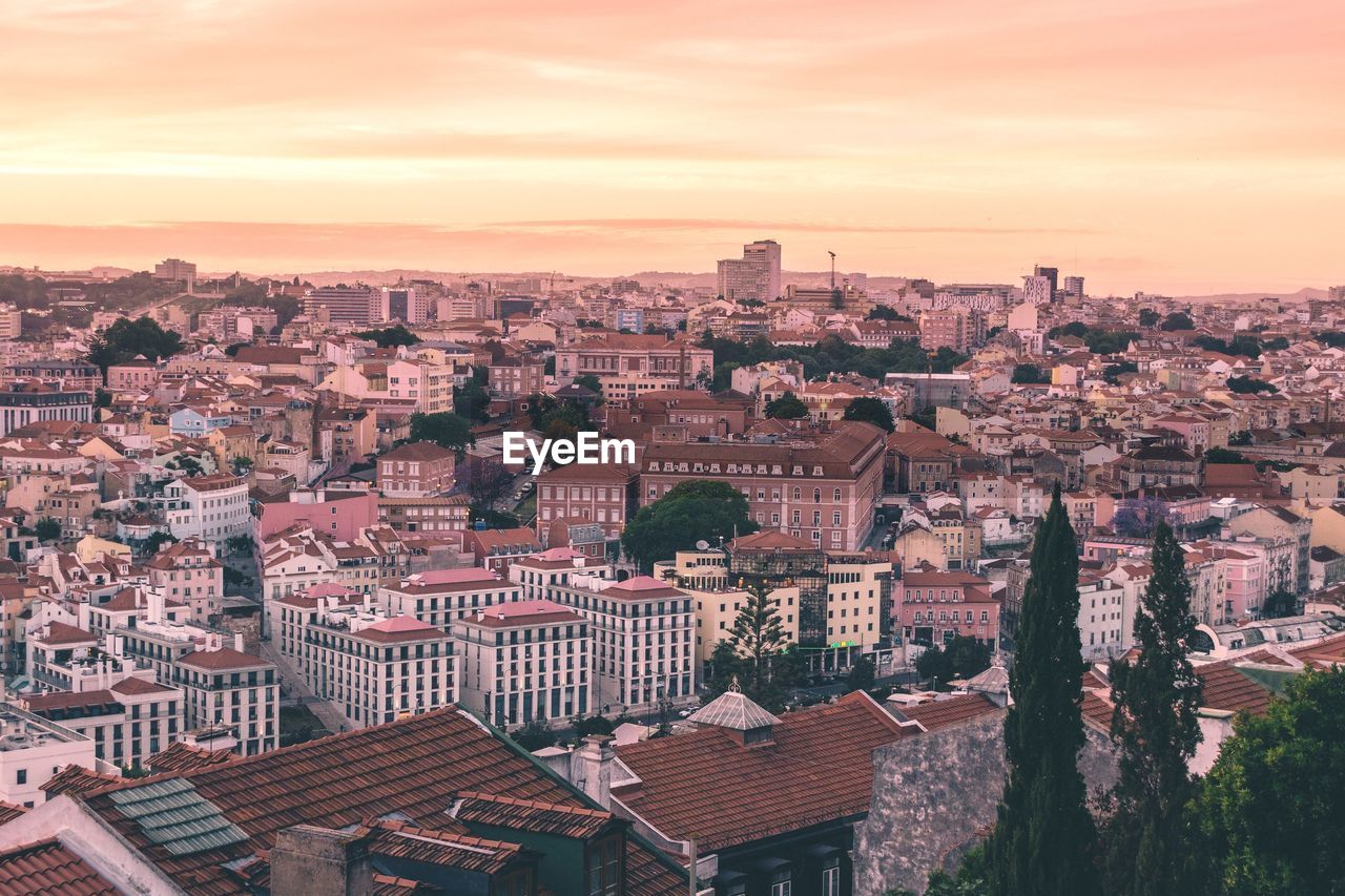 Aerial view of cityscape against sky