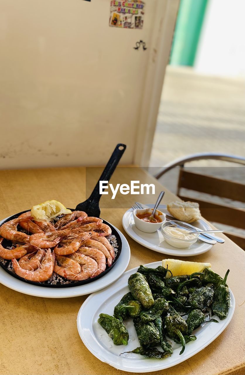 High angle view of seafood shrimp  served on table