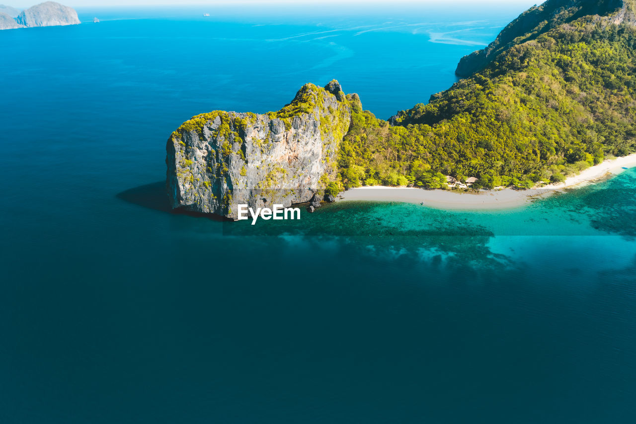 SCENIC VIEW OF SEA AND ROCK FORMATION